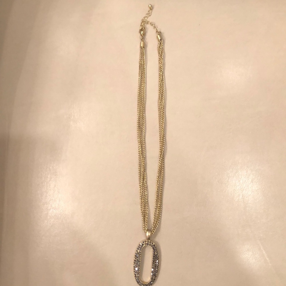 Necklace with grey crystal pendant